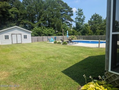 This four bedrooom, two and a half bath has everything you could on Rock Creek Country Club in North Carolina - for sale on GolfHomes.com, golf home, golf lot