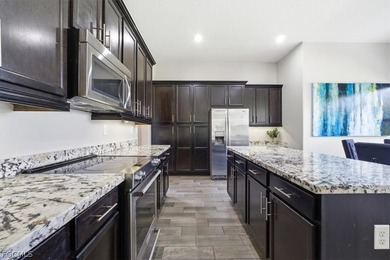 Beautiful 4-bedroom, 3-bath single-family home located in the on Panther Run Golf Club in Florida - for sale on GolfHomes.com, golf home, golf lot