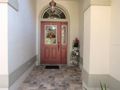 Charming three-bedroom, two-bathroom home featuring a two-car on Citrus Springs Country Club in Florida - for sale on GolfHomes.com, golf home, golf lot