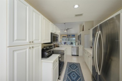 Live the Florida lifestyle in this spectacular turnkey-furnished on Tara Golf and Country Club in Florida - for sale on GolfHomes.com, golf home, golf lot