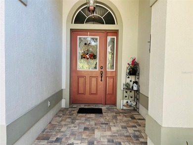 Charming three-bedroom, two-bathroom home featuring a two-car on Citrus Springs Country Club in Florida - for sale on GolfHomes.com, golf home, golf lot