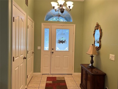 Charming three-bedroom, two-bathroom home featuring a two-car on Citrus Springs Country Club in Florida - for sale on GolfHomes.com, golf home, golf lot