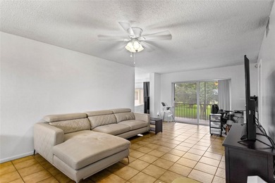 Beautifully maintained top-floor unit in sought-after Hollybrook on Hollybrook Golf and Tennis Club  in Florida - for sale on GolfHomes.com, golf home, golf lot