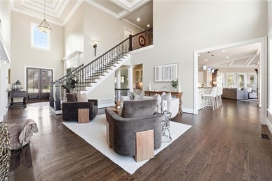 This stunning brick estate in prestigious, gated Laurel Springs on Laurel Springs Golf Club in Georgia - for sale on GolfHomes.com, golf home, golf lot