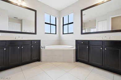 Beautiful 4-bedroom, 3-bath single-family home located in the on Panther Run Golf Club in Florida - for sale on GolfHomes.com, golf home, golf lot