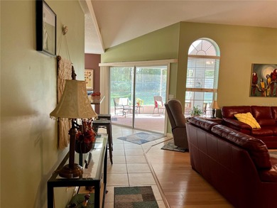 Charming three-bedroom, two-bathroom home featuring a two-car on Citrus Springs Country Club in Florida - for sale on GolfHomes.com, golf home, golf lot