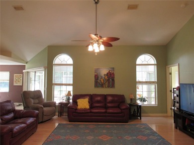 Charming three-bedroom, two-bathroom home featuring a two-car on Citrus Springs Country Club in Florida - for sale on GolfHomes.com, golf home, golf lot