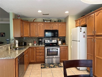 Charming three-bedroom, two-bathroom home featuring a two-car on Citrus Springs Country Club in Florida - for sale on GolfHomes.com, golf home, golf lot