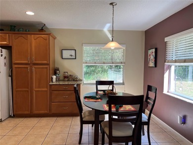 Charming three-bedroom, two-bathroom home featuring a two-car on Citrus Springs Country Club in Florida - for sale on GolfHomes.com, golf home, golf lot