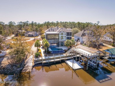 5 Bedrooms | 6 Baths | Over 7,500 Sq Ft | Bayou Front | Fully on Diamondhead Country Club in Mississippi - for sale on GolfHomes.com, golf home, golf lot