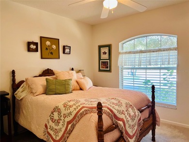 Charming three-bedroom, two-bathroom home featuring a two-car on Citrus Springs Country Club in Florida - for sale on GolfHomes.com, golf home, golf lot