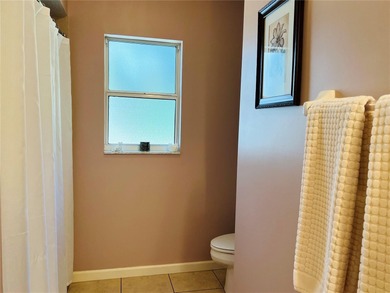 Charming three-bedroom, two-bathroom home featuring a two-car on Citrus Springs Country Club in Florida - for sale on GolfHomes.com, golf home, golf lot