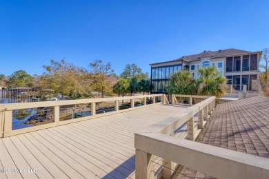 5 Bedrooms | 6 Baths | Over 7,500 Sq Ft | Bayou Front | Fully on Diamondhead Country Club in Mississippi - for sale on GolfHomes.com, golf home, golf lot