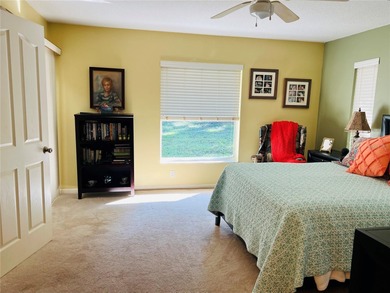 Charming three-bedroom, two-bathroom home featuring a two-car on Citrus Springs Country Club in Florida - for sale on GolfHomes.com, golf home, golf lot