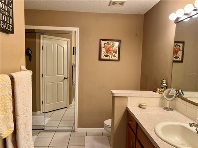 Charming three-bedroom, two-bathroom home featuring a two-car on Citrus Springs Country Club in Florida - for sale on GolfHomes.com, golf home, golf lot