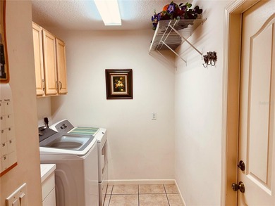 Charming three-bedroom, two-bathroom home featuring a two-car on Citrus Springs Country Club in Florida - for sale on GolfHomes.com, golf home, golf lot