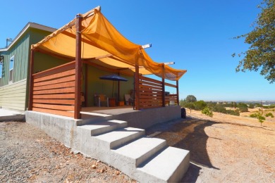 This amazing newer manufactured home on a permanent foundation on La Contenta Golf Course in California - for sale on GolfHomes.com, golf home, golf lot