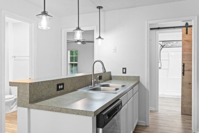 Prime Location in Surfside Beach! Just minutes from the ocean on Tupelo Bay Golf Complex  in South Carolina - for sale on GolfHomes.com, golf home, golf lot