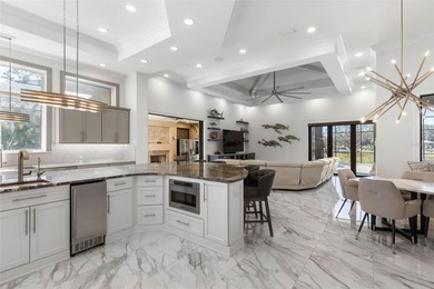 Spectacular Intracoastal Pool Estate with Private Dock & Covered on Grand Haven Golf Club in Florida - for sale on GolfHomes.com, golf home, golf lot