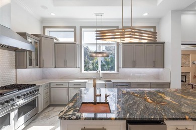 Spectacular Intracoastal Pool Estate with Private Dock & Covered on Grand Haven Golf Club in Florida - for sale on GolfHomes.com, golf home, golf lot