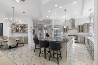 Spectacular Intracoastal Pool Estate with Private Dock & Covered on Grand Haven Golf Club in Florida - for sale on GolfHomes.com, golf home, golf lot