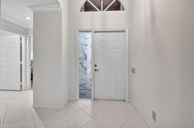 Welcome Home. This is the Balmoral Model w/ the Wall removed on  in Florida - for sale on GolfHomes.com, golf home, golf lot