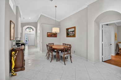 Welcome Home. This is the Balmoral Model w/ the Wall removed on  in Florida - for sale on GolfHomes.com, golf home, golf lot