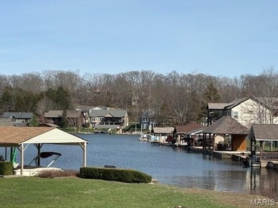 This is it! An incredible opportunity to own a waterfront lot on on Raintree Country Club in Missouri - for sale on GolfHomes.com, golf home, golf lot