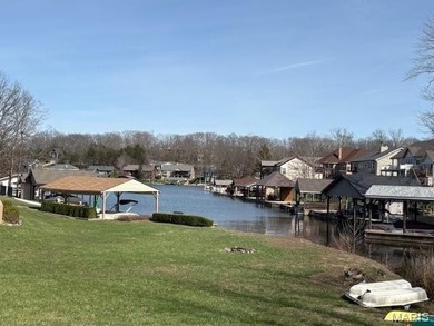 This is it! An incredible opportunity to own a waterfront lot on on Raintree Country Club in Missouri - for sale on GolfHomes.com, golf home, golf lot