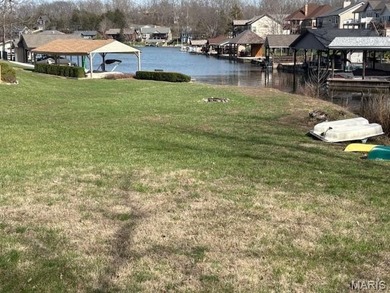 This is it! An incredible opportunity to own a waterfront lot on on Raintree Country Club in Missouri - for sale on GolfHomes.com, golf home, golf lot