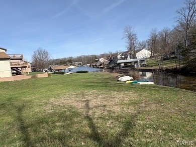 This is it! An incredible opportunity to own a waterfront lot on on Raintree Country Club in Missouri - for sale on GolfHomes.com, golf home, golf lot