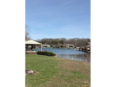 This is it! An incredible opportunity to own a waterfront lot on on Raintree Country Club in Missouri - for sale on GolfHomes.com, golf home, golf lot