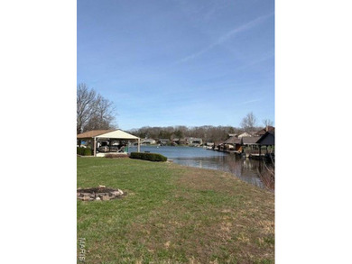 This is it! An incredible opportunity to own a waterfront lot on on Raintree Country Club in Missouri - for sale on GolfHomes.com, golf home, golf lot