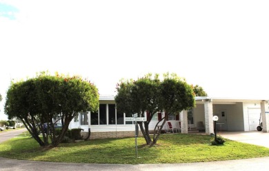 Enter the elegance of this beautifully manicured large 2-bedroom on Schalamar Creek Golf and Country Club in Florida - for sale on GolfHomes.com, golf home, golf lot