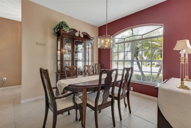 SENSATIONAL WATER VIEW from a MASSIVE enclosed and tiled lanai on Kings Gate Golf Club in Florida - for sale on GolfHomes.com, golf home, golf lot