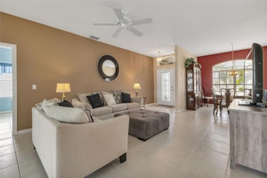 SENSATIONAL WATER VIEW from a MASSIVE enclosed and tiled lanai on Kings Gate Golf Club in Florida - for sale on GolfHomes.com, golf home, golf lot