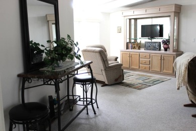 Enter the elegance of this beautifully manicured large 2-bedroom on Schalamar Creek Golf and Country Club in Florida - for sale on GolfHomes.com, golf home, golf lot