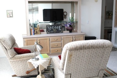 Enter the elegance of this beautifully manicured large 2-bedroom on Schalamar Creek Golf and Country Club in Florida - for sale on GolfHomes.com, golf home, golf lot