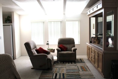 Enter the elegance of this beautifully manicured large 2-bedroom on Schalamar Creek Golf and Country Club in Florida - for sale on GolfHomes.com, golf home, golf lot