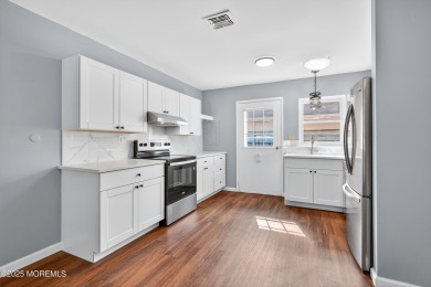 Come see this Beautifully Renovated Marlborough End-Unit Condo on Greenbriar Woodlands in New Jersey - for sale on GolfHomes.com, golf home, golf lot