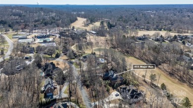 You'll love this full brick home in an amazing location on the on Cramer Mountain Country Club in North Carolina - for sale on GolfHomes.com, golf home, golf lot