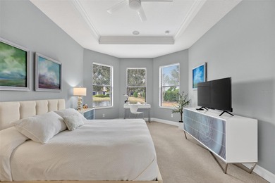 MAINTENANCE-FREE ELEGANCE WITH POND VIEWS! Welcome to your on Esplanade Golf and Country at Lakewood Ranch in Florida - for sale on GolfHomes.com, golf home, golf lot