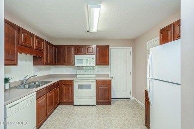 2BR/2BA ONE LEVEL (No Stairs) Brick Ranch End Unit Condo by on Whittle Springs Golf Course in Tennessee - for sale on GolfHomes.com, golf home, golf lot