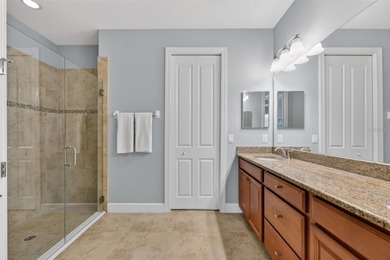 MAINTENANCE-FREE ELEGANCE WITH POND VIEWS! Welcome to your on Esplanade Golf and Country at Lakewood Ranch in Florida - for sale on GolfHomes.com, golf home, golf lot