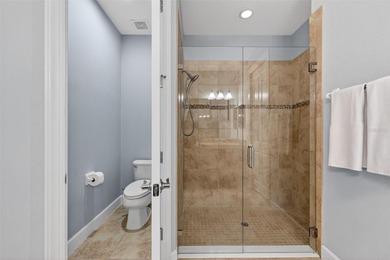 MAINTENANCE-FREE ELEGANCE WITH POND VIEWS! Welcome to your on Esplanade Golf and Country at Lakewood Ranch in Florida - for sale on GolfHomes.com, golf home, golf lot