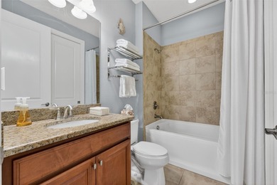 MAINTENANCE-FREE ELEGANCE WITH POND VIEWS! Welcome to your on Esplanade Golf and Country at Lakewood Ranch in Florida - for sale on GolfHomes.com, golf home, golf lot