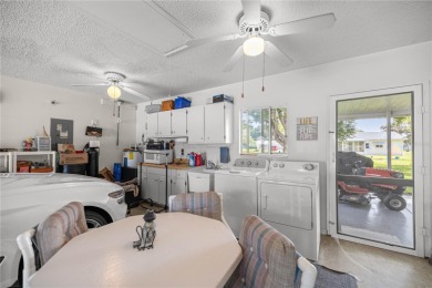 Beautiful 2 Bed, 2 Bath, 2 car attached garage facing front on The Links of Spruce Creek in Florida - for sale on GolfHomes.com, golf home, golf lot