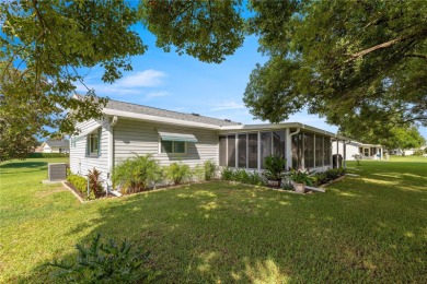 Beautiful 2 Bed, 2 Bath, 2 car attached garage facing front on The Links of Spruce Creek in Florida - for sale on GolfHomes.com, golf home, golf lot