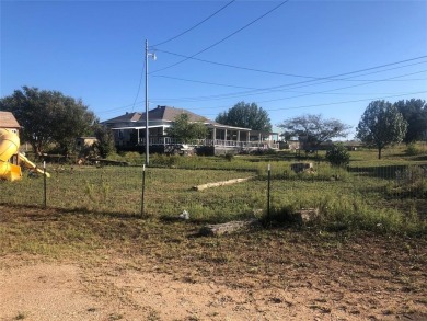 Golf Course Road Cottage- This home on 1.49 acres has just on San Saba River Golf Course in Texas - for sale on GolfHomes.com, golf home, golf lot