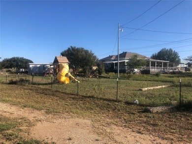 Golf Course Road Cottage- This home on 1.49 acres has just on San Saba River Golf Course in Texas - for sale on GolfHomes.com, golf home, golf lot